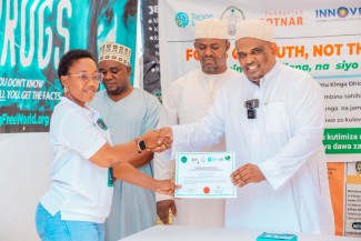 participants with attendance certificates at the end of the training.