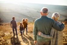 Two people embracing outdoors