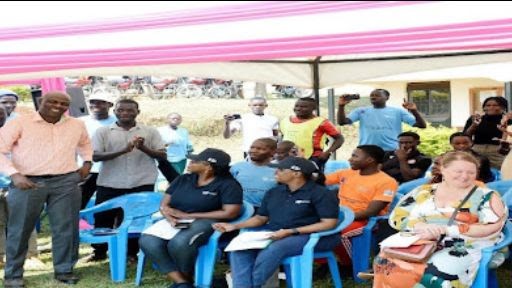 Dr. Rogers Kasirye welcomes distinguished visitors, including guests from UNODC and Dr. Monica Swahn, Dean of the VCU School of Public Health.
